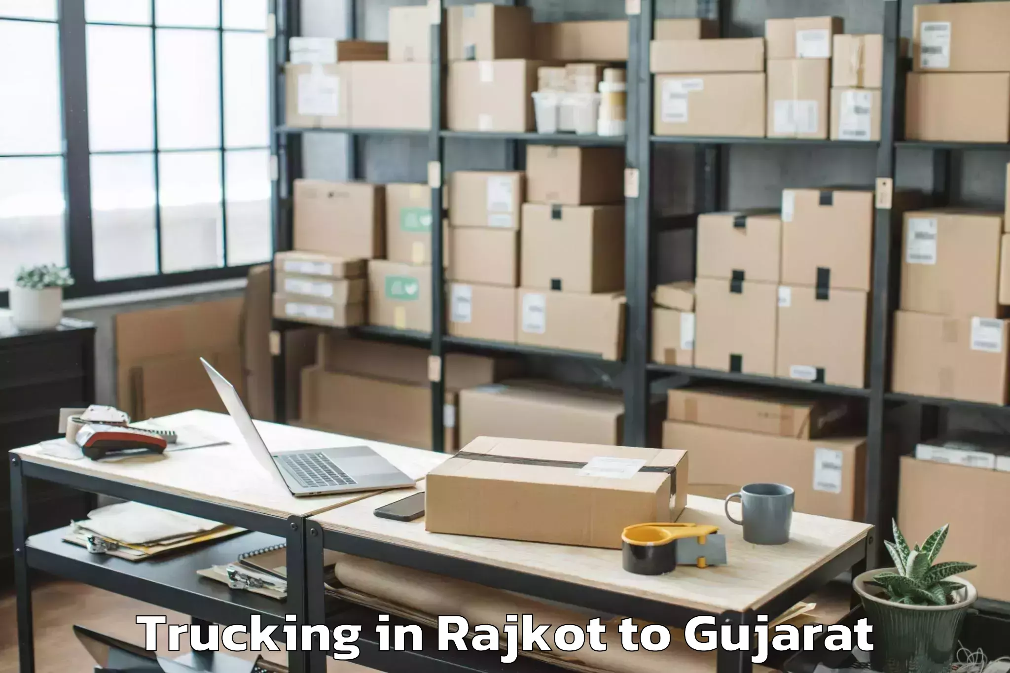 Easy Rajkot to Dharampur Valsad Trucking Booking